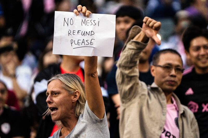 Fans react to Lionel Messi not playing in a friendly between Hong Kong Team and Inter Miami (Louise Delmotte/AP)