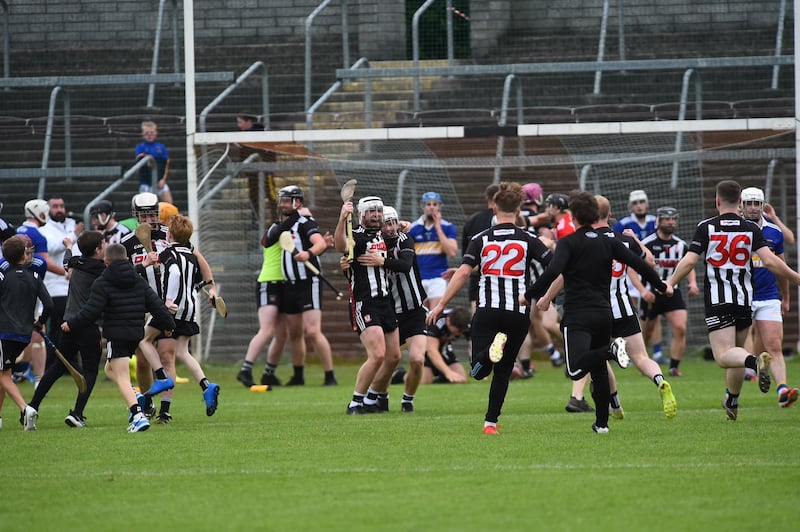 Middletown players celebrate with their fans after the full-time whistle in their historic Armagh SHC final win