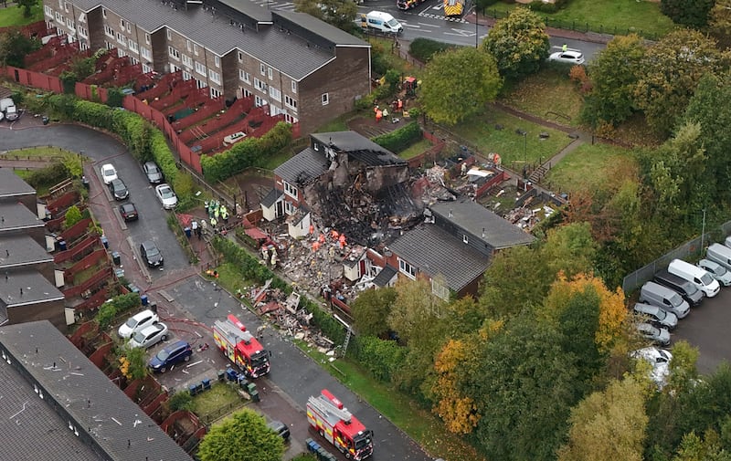 The house was still smouldering and the fire service had search dogs at the scene