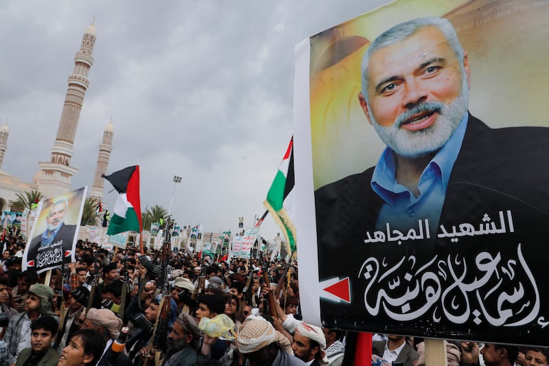 Yemenis protest to condemn the killing of Hamas leader Ismail Haniyeh, in Sanaa, Yemen (Osamah Abdulrahman/AP)