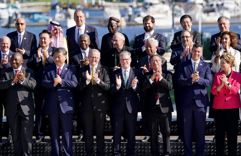 Sir Keir Starmer (front centre) with leaders of the G20 members as they pose for the photo of the Global Alliance Against Hunger and Poverty at the Museum of Modern Art in Rio de Janeiro