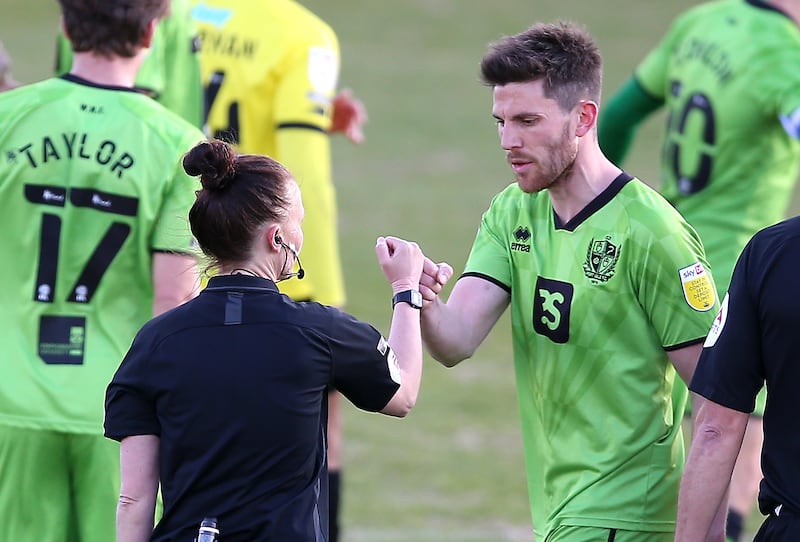 Welch was congratulated by Port Vale’s Shaun Brisley after she became the EFL’s first female referee at Harrogate in 2021