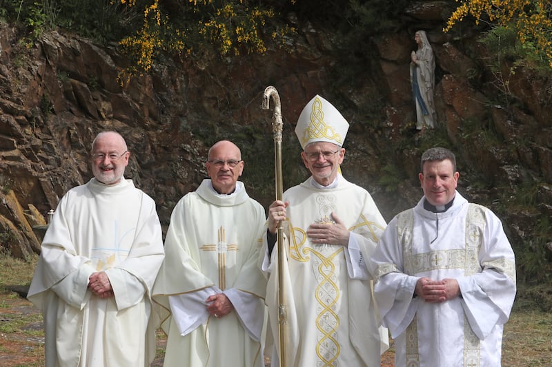 Bishop of Down and Connor Alan McGuckian SJ, Canon John Murray PP of St Patrick's, Downpatick, Fr Robert McMahon, PP of Saul and Ballee, and Deacon Jackie Breen after the celebration of Mass on St Patrick’s Mountain, Saul