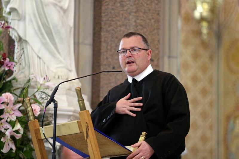 Clonard Rector, Fr Noel Kehoe, thanks the congregation and volunteers on the last day of this year's Novena. Picture by Mal McCann.