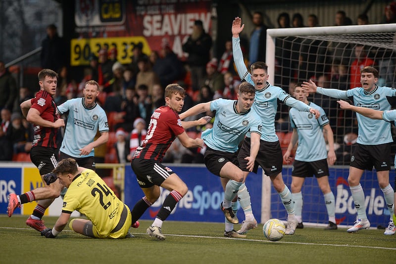 The late Michael Newbury (second left, sky blue jersey) playing against Crusaders on St Stephen's Day