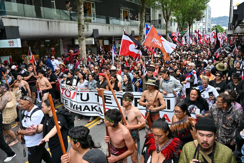 NZ’s Maori people march through the central business district (Mark Tantrum/AP)