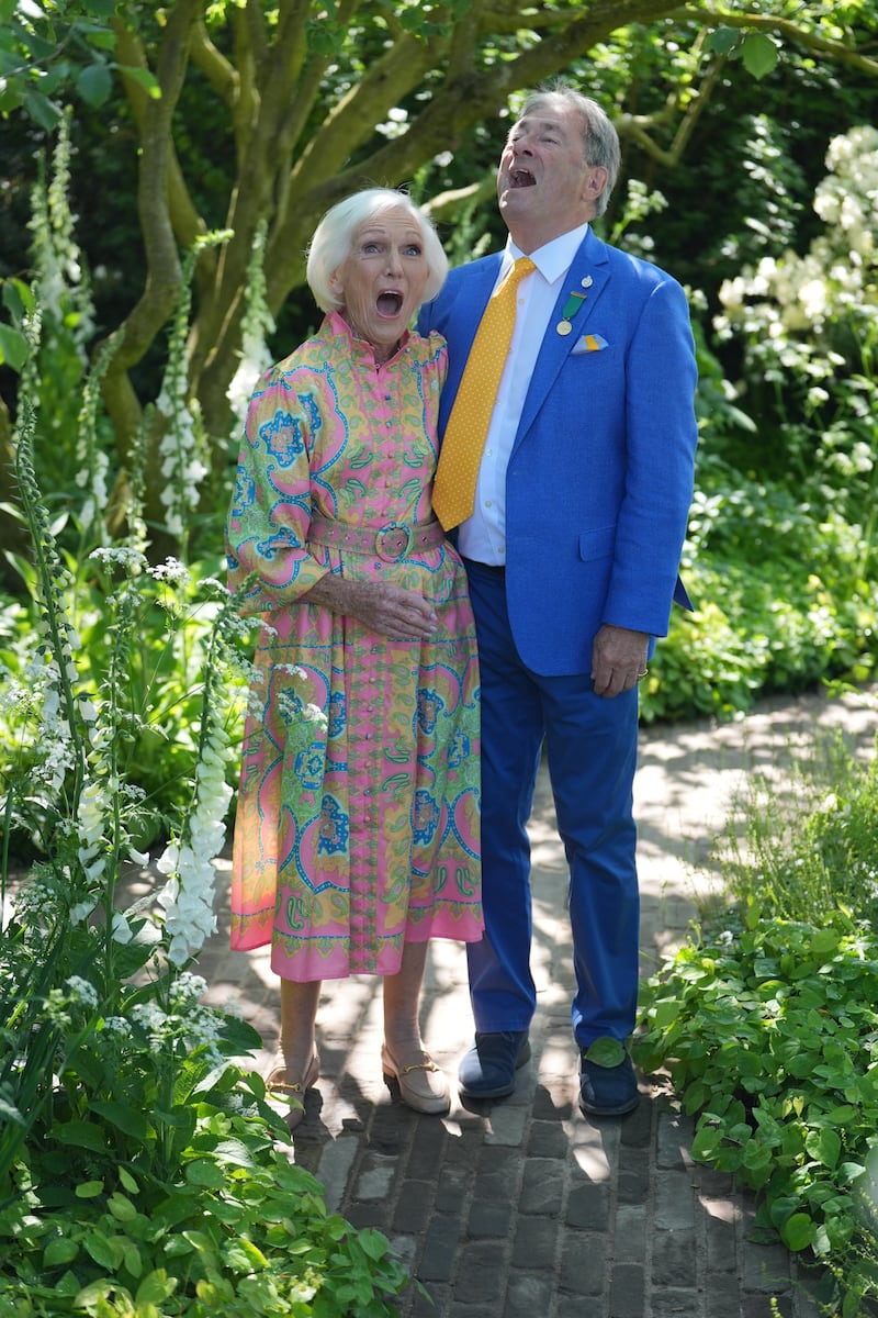 Dame Mary Berry and Alan Titchmarsh in the National Garden Scheme garden, at the Chelsea Flower Show at the Royal Hospital Chelsea in London