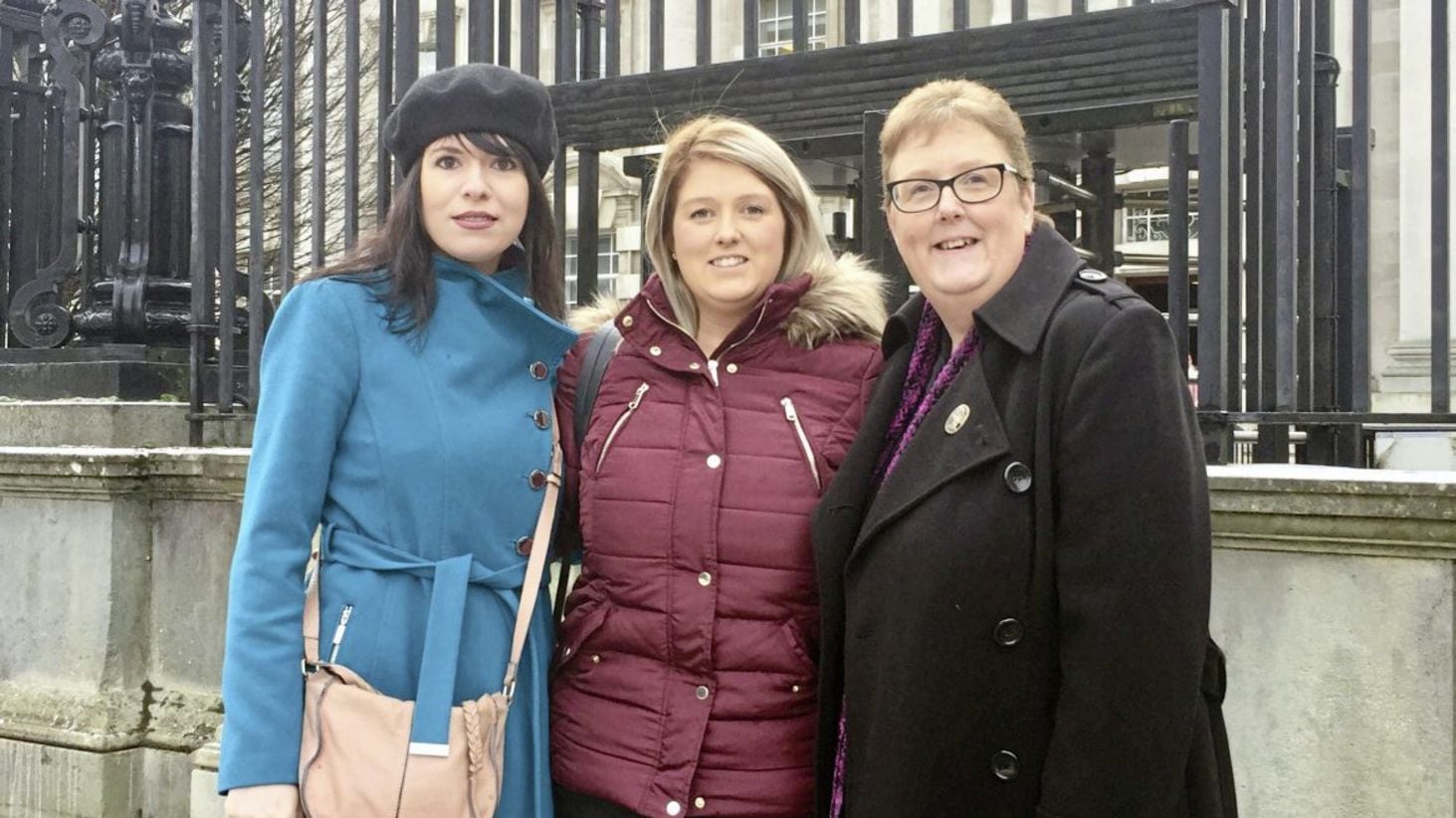From left, Amnesty International&#39;s Grainne Teggart, Sarah Ewart and Jane Christie outside the High Court in Belfast on Thursday. Picture by David Young/PA 