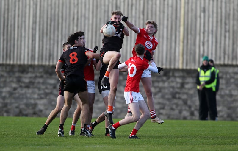 Magherafelt's Emmett Spiers in action with Clann Eireann's Tiarnan Mc Donald     in yesterday's Ulster Minor Semi Final  game at St Pauls GAC