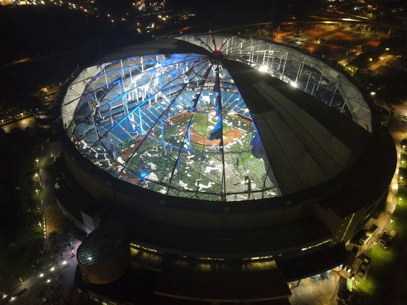 An aerial view of Tropicana Field’s shredded roof in St Petersburg (Max Chesnes/Tampa Bay Times/AP)