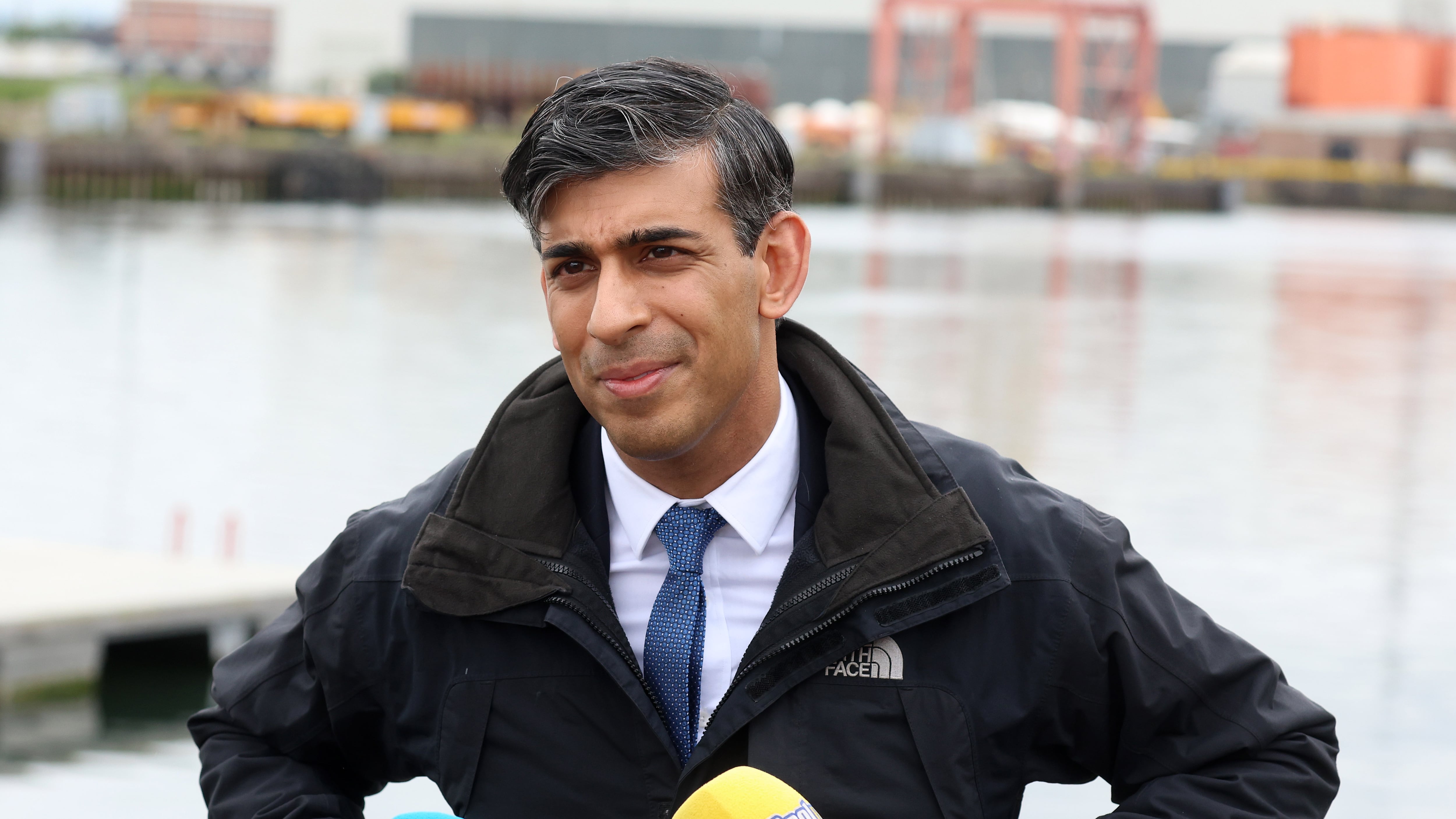 British Prime Minister Rishi Sunak with his hands in his pockets in Belfast with outgoing NI Secretary of State Chris Heaton-Harris on the latest leg of his election campaign tour in Belfast. PICTURE: MAL MCCANN