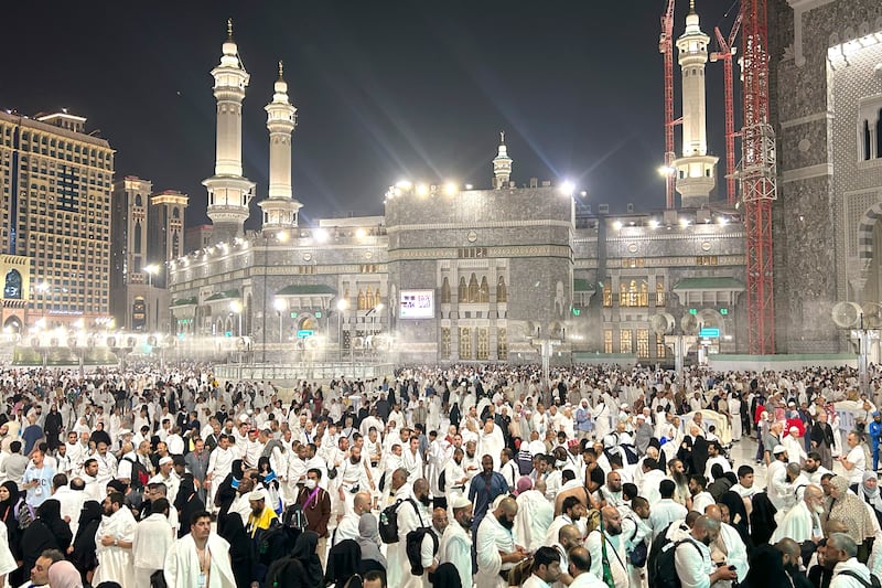 Pilgrims leave after offering prayers outside at the Grand Mosque during the annual Hajj pilgrimage in Mecca (AP)