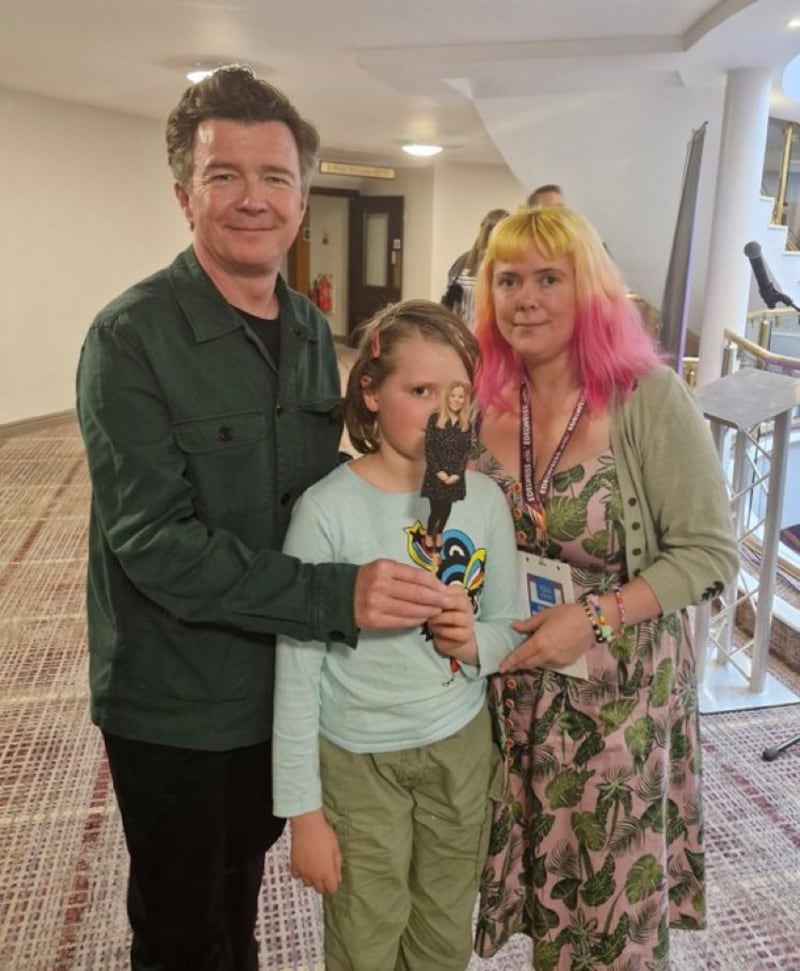 Rick Astley (left), with Helen Tamblyn-Saville (right) and her daughter (middle) and Chopstick Sally