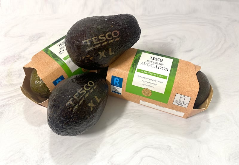 Tesco is to use laser-etchings on its extra large avocados instead of stickers in a trial designed to help the environment.