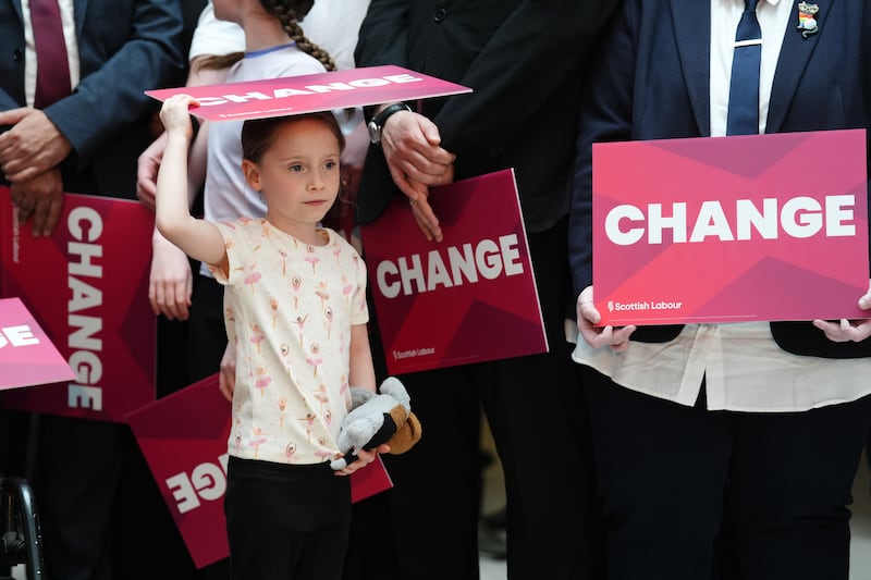 People wait for the arrival of Labour leader Sir Keir Starmer and Scottish Labour leader Anas Sarwar in Glasgow