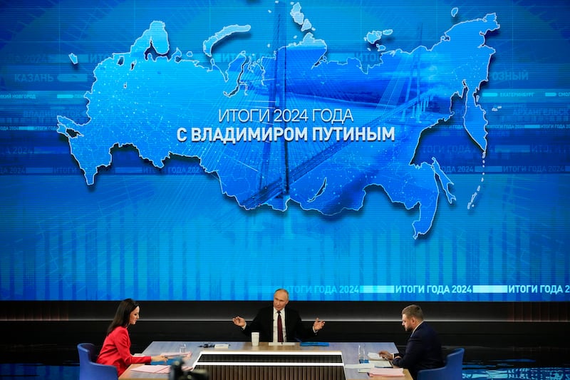 Russian President Vladimir Putin speaks during his annual news conference (Alexander Zemlianichenko/AP)