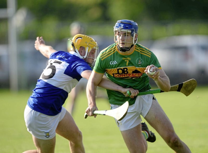 St Johns v Dunloy Snr Championship Hurling 02/09/2023.  St Johns Oisin McManus and Dunloy&rsquo;s Eoin McFerran during the game.  Picture Mark Marlow 