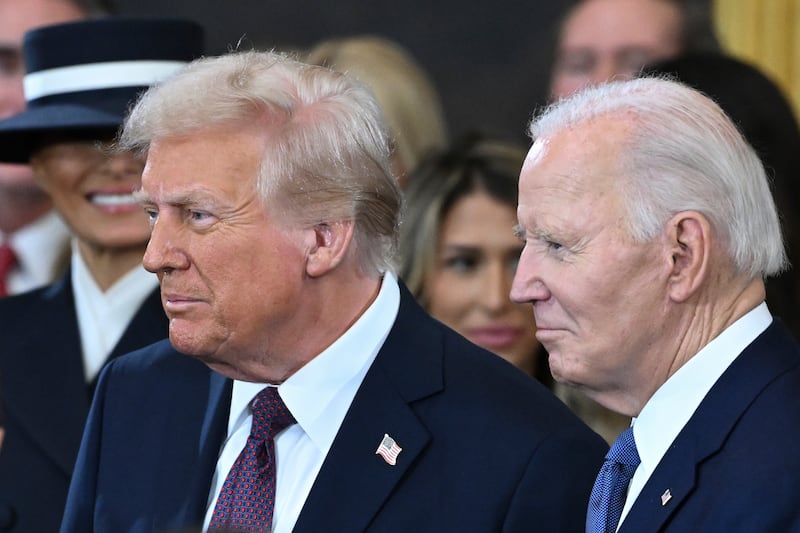 Joe Biden and Donald Trump stand together (Saul Loeb/Pool photo via AP)