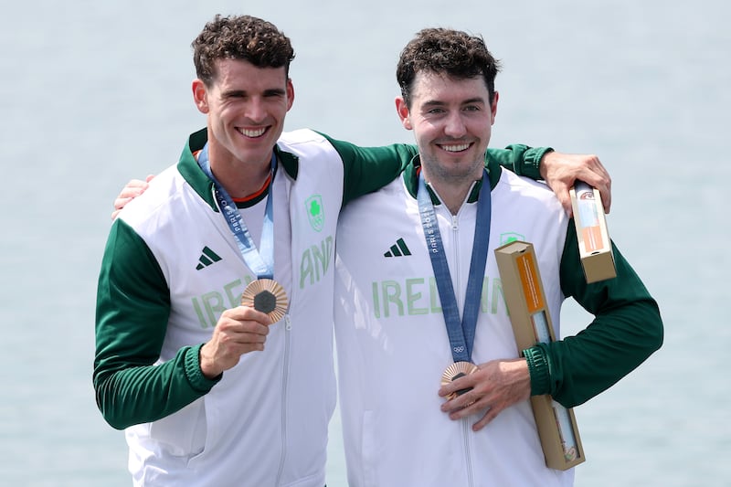 Philip Doyle and Daire Lynch celebrate with their bronze medals after Thursday's double sculls final in Paris. Picture by Alex Davidson/Getty Images