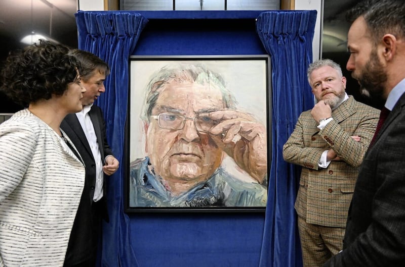 SDLP MP Claire Hanna, John Hume Jr, artist Colin Davidson and SDLP leader Colum Eastwood pictured at the Westminster unveiling of the new John Hume portrait last night. 