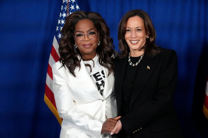 Democratic presidential nominee Vice President Kamala Harris, right, poses with Oprah Winfrey at a campaign rally outside the Philadelphia Museum of Art in Philadelphia. (Jacquelyn Martin/AP)