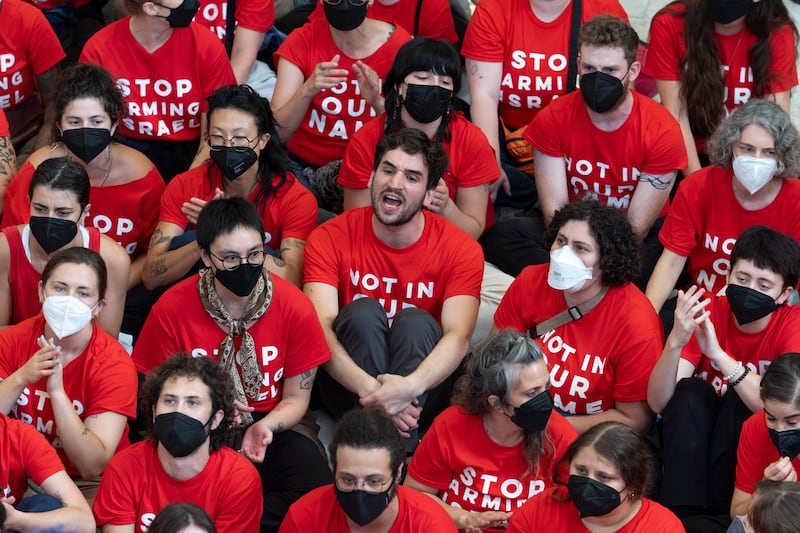 Demonstrators staged a sit-in protest against the arrival of Israeli Prime Minister Benjamin Netanyahu (AP Photo/J Scott Applewhite)