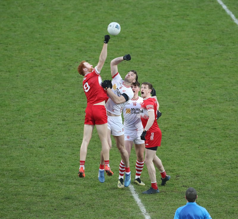 Conor Glass rises highest in a midfield battle against Tyrone last year.