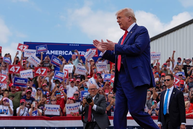 Donald Trump arrives at the campaign rally in North Carolina (Julia Nikhinson/AP)