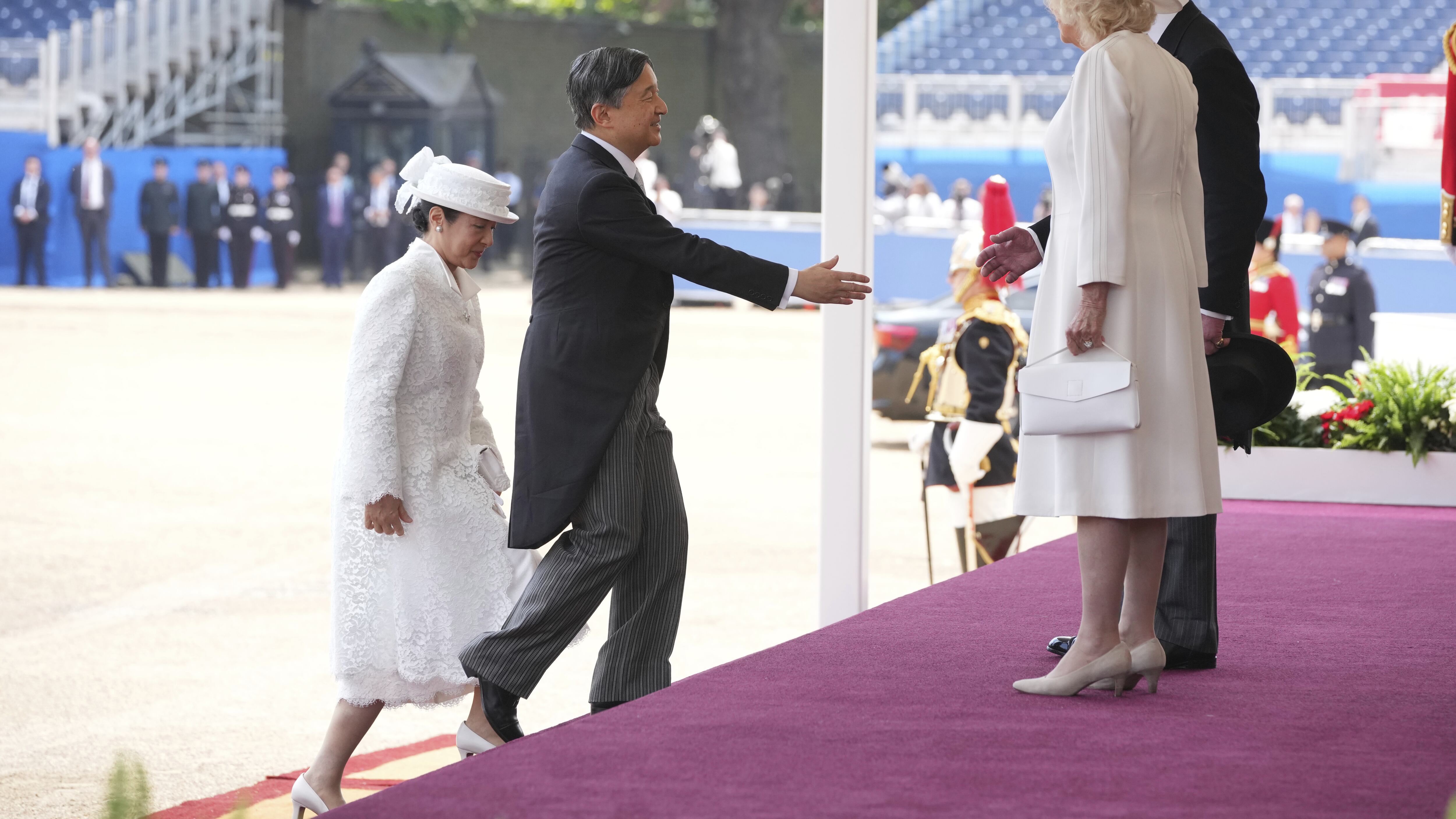The King, left, and Emperor Naruhito arriving at Buckingham Palace