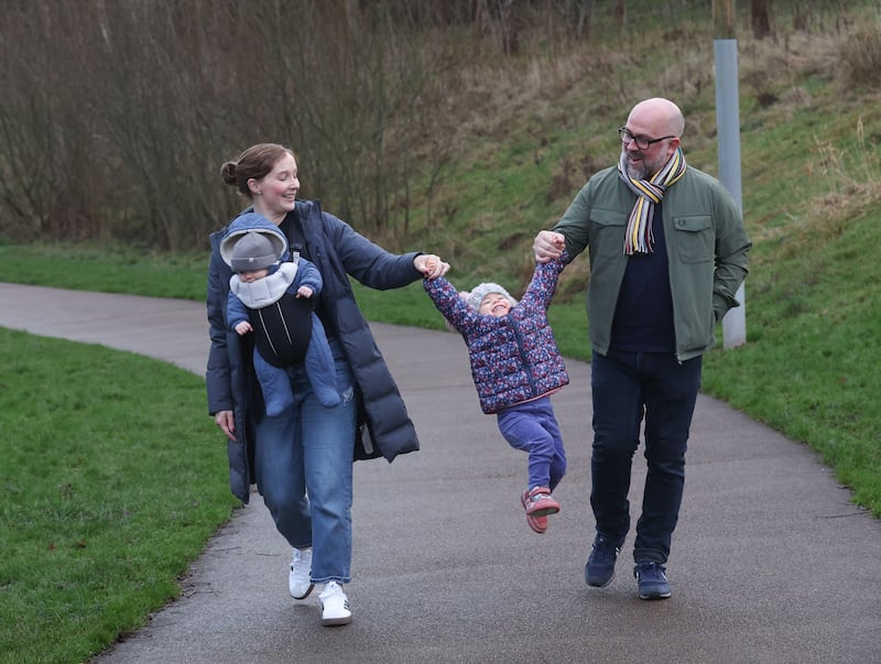 Jonathan and Kathy Porter who met threw a running club,  with Children Louisa and Fionn.
PICTURE COLM LENAGHAN