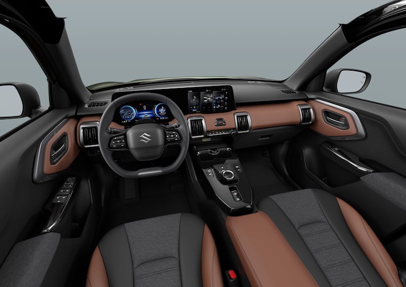 The interior features a digital driver’s display and floating centre console. (Suzuki)