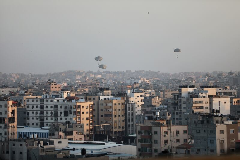 Humanitarian aid was airdropped into Gaza on Saturday (Mohammed Hajjar/AP)
