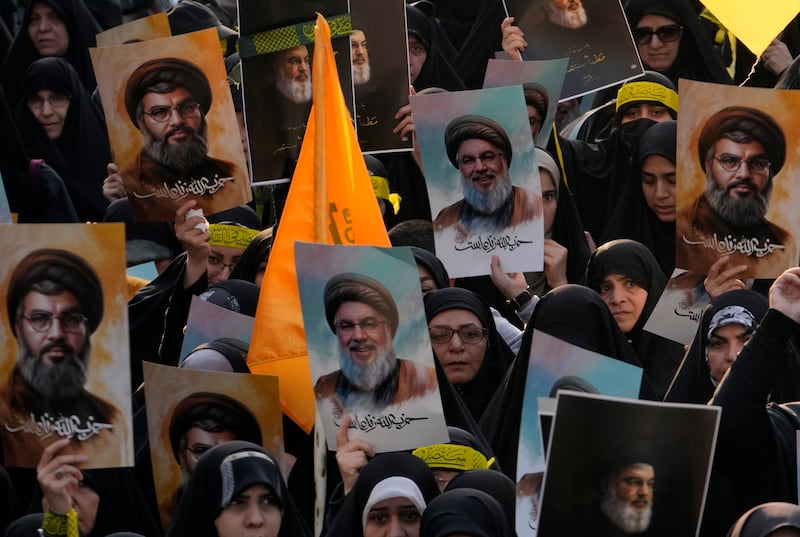 Mourners attend a rally commemorating Hezbollah leader Hassan Nasrallah (Vahid Salemi/AP)