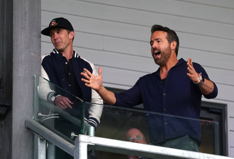 Wrexham co-owners Rob McElhenney, left, and Ryan Reynolds believe the club’s historic Racecourse home could be expanded to accommodate up to 55,000 fans