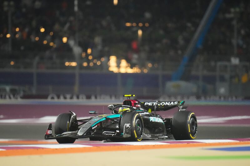 Lewis Hamilton had a race to forget in Qatar (Darko Bandic/AP)