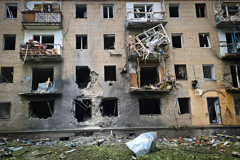 A Russian army attack damaged buildings in Kherson (Kherson Regional Military Administration via AP)