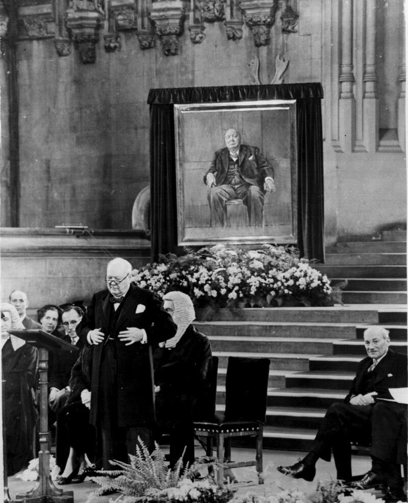 Sir Winston Churchill with an oil portrait by Graham Sutherland