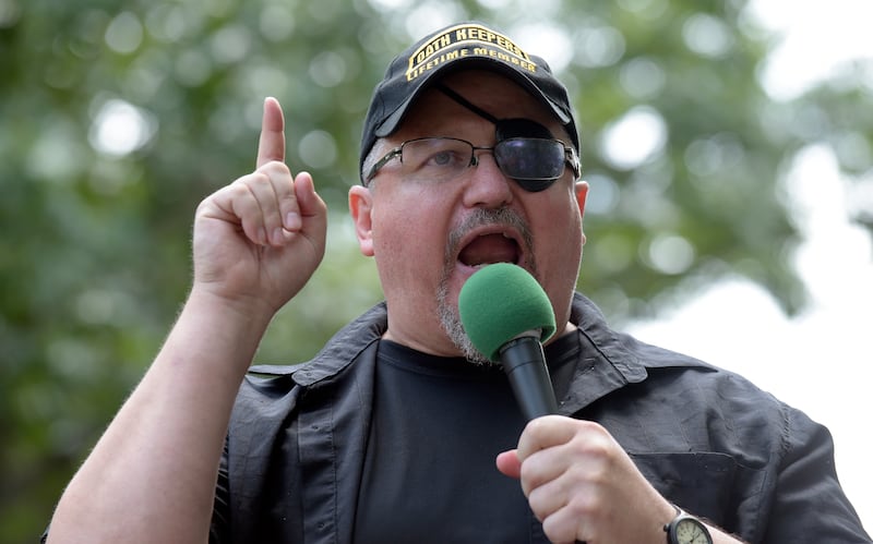 Stewart Rhodes, founder of the Oath Keepers, speaks during a rally outside the White House in Washington in 2017 (Susan Walsh/AP)