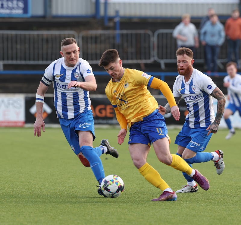 Dungannon's Rhyss Campbell and Coleriane Stephen O Donnell     In today's  game at Ballycastle rd Coleraine v Dungannon  Sports Direct premiership   on  23/3/24  Pacemaker Press