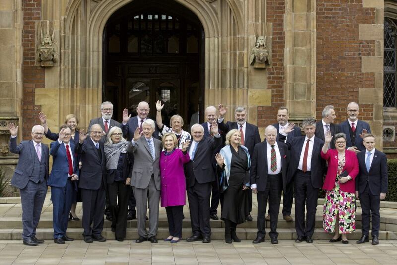 (front row left to right) Former Irish diplomat Tim O'Connor, Queen's University Vice-Chancellor Prof Ian Greer, Senator George Mitchell and his wife Heather MacLachlan, former US President Bill Clinton and former US Secretary of State Hillary Clinton, former taoiseach Bertie Ahern, former TD Liz O'Donnell, former Secretary of State Lord Murphy, Prof Jonathan Powell, former PUP leader Dawn Purvis and Ryan Feeney of QUB, (back row left to right) Deputy Lieutenant for Belfast Jane Wells, former Sinn Fein president Gerry Adams, former Deputy First Minister Mark Durkan, former Women's Coalition leader Monica McWilliams, Lord Reg Empey, Lord Alderdice, former UDP leader Gary McMichael, DUP MP Ian Paisley Jnr and QUB Professor Richard English during a photocall on the steps of the Lanyon Buildings at Queen's University Belfast during an event marking the 25th anniversary of the Good Friday Agreement