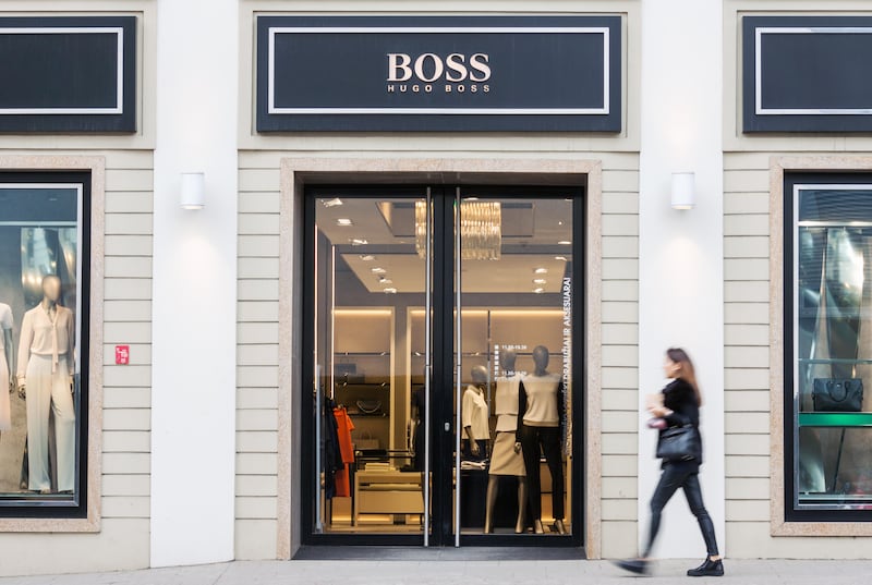 Hugo Boss has predicted a drop in sales amidst troubling economic climate