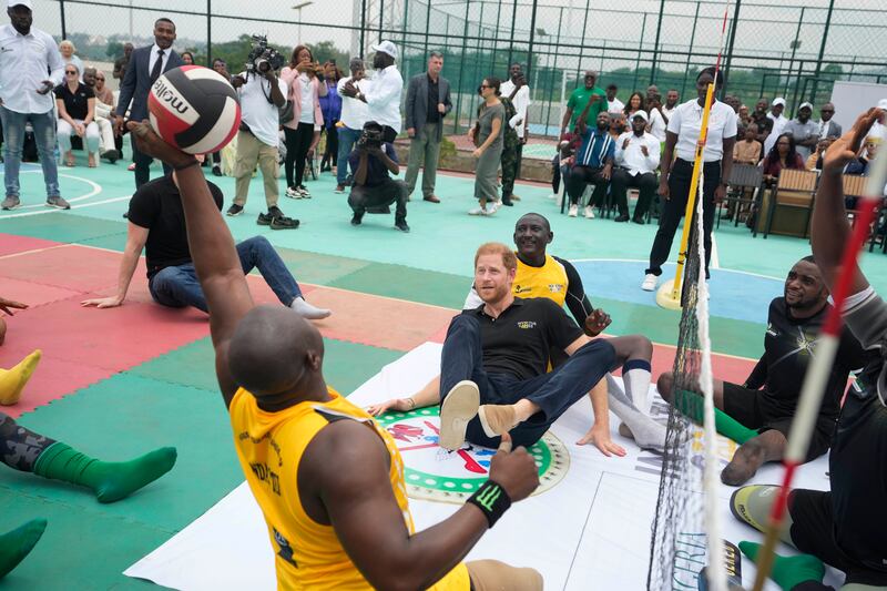 Harry taking part in an exhibition sitting volleyball match in Abuja