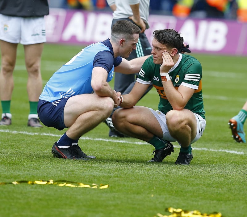 Fellow Footballer of the Year nominee Brian Fenton consoles Kerry captain David Clifford after the All-Ireland SFC Final.