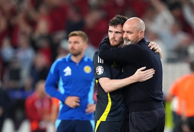 Scotland boss Steve Clarke (right) remains under contract until 2026