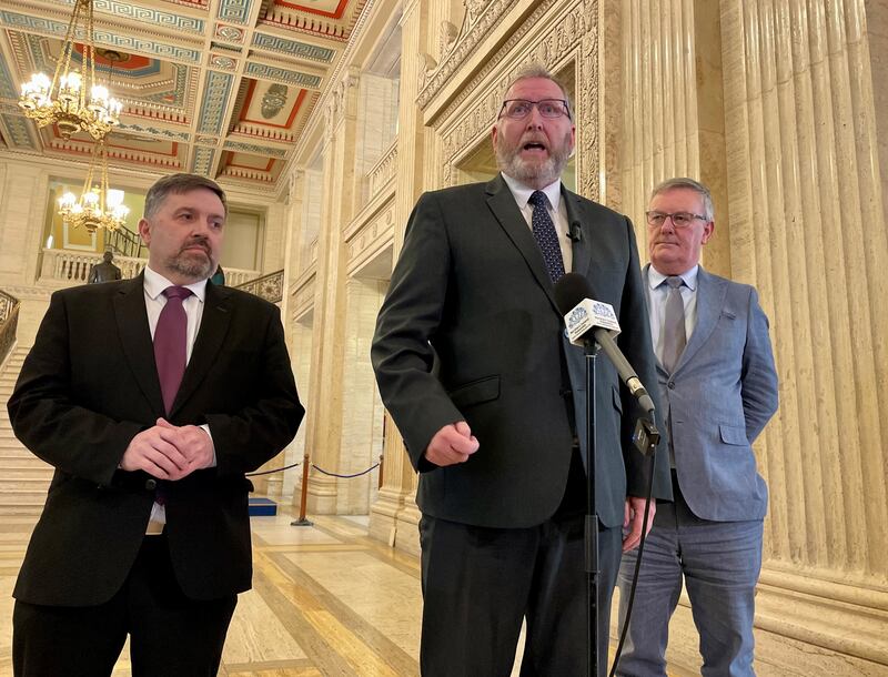 The UUP's Robin Swann (left), Doug Beattie (centre) and Mike Nesbitt speak to the media about the latest Stormont budget in the Great Hall of Parliament Buildings