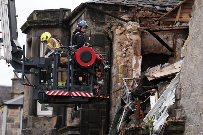 Fire investigators at the scene of the explosion