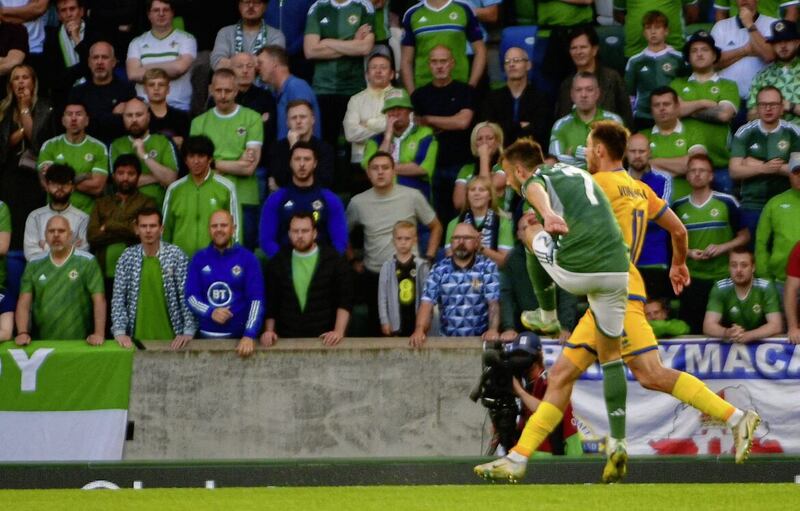 Conor McMenamin of Northern Ireland has his shot saved by Igor Shatskiy of Kazakhstan.