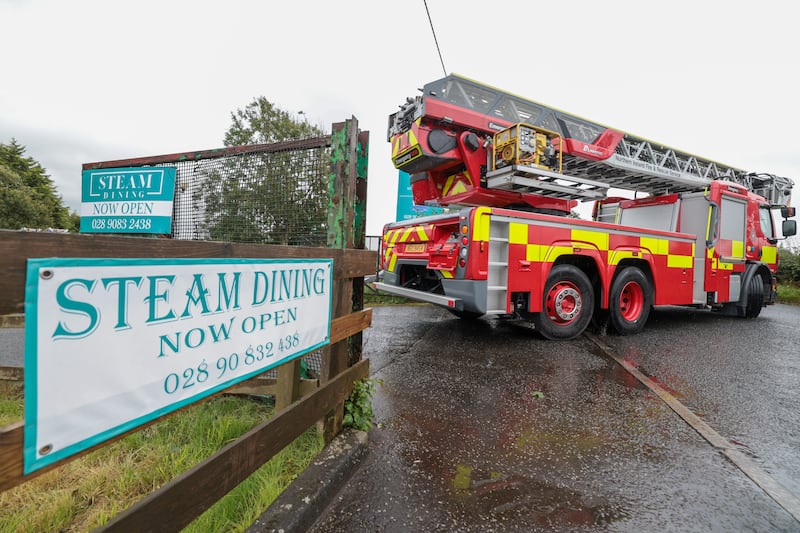 Press Eye - Belfast - Northern Ireland - 21st August 2024

The scene on the Ballyclare Road, Ballyclare as an earlier fire at premises in the had reignited. 
The restaurant has suffered significant damage following a racially motivated arson attack.

Picture by Matt Mackey / PressEye