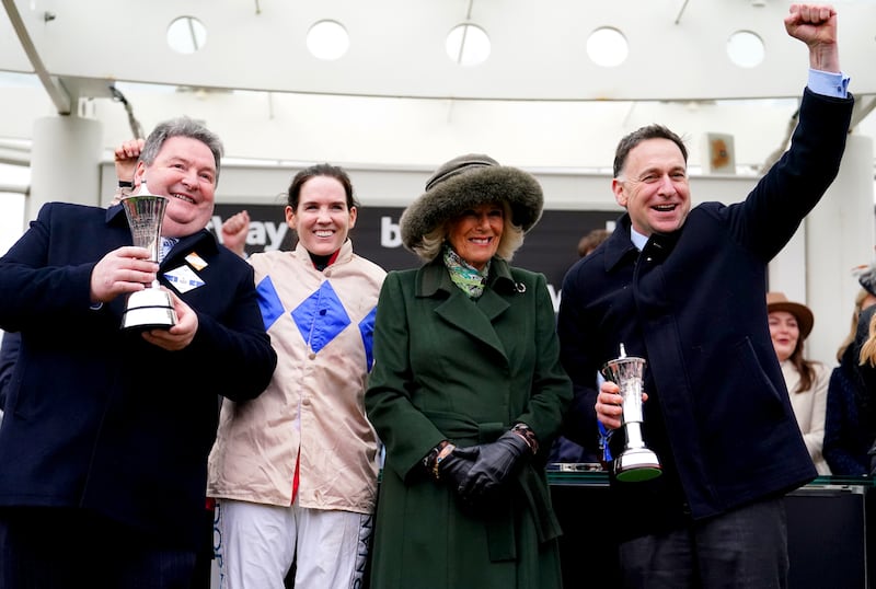 Owner Declan Landy, jockey Rachael Blackmore and trainer Henry De Bromhead pose for a photo with Queen Camilla