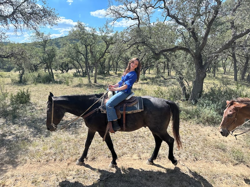 Riding horseback on ranch